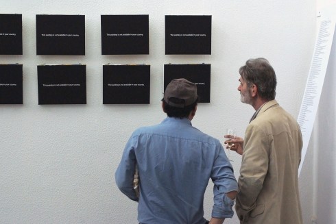 Wall full of "This painting ..." paintings